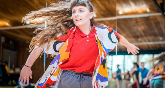 Alice Shepperson dancing in the studio.