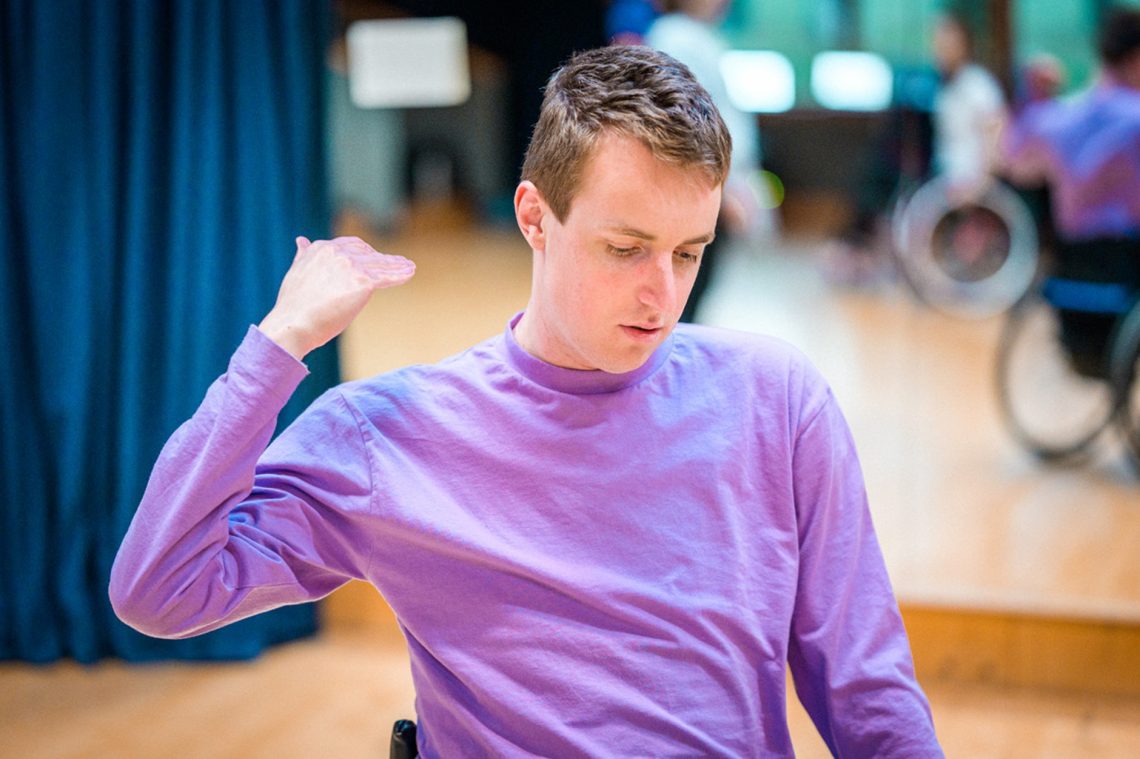 A male wheelchair dancer in the dance studio