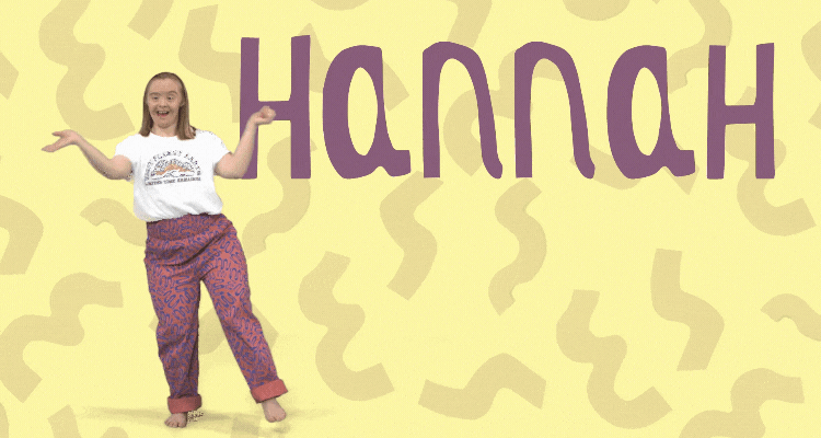 Hannah dancing. Her name is in big paper cut-out letters. The background is a pale yellow with light purple squiggles matching Hannah's pink trousers.