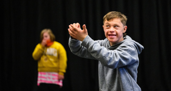 A young disabled dancer during class