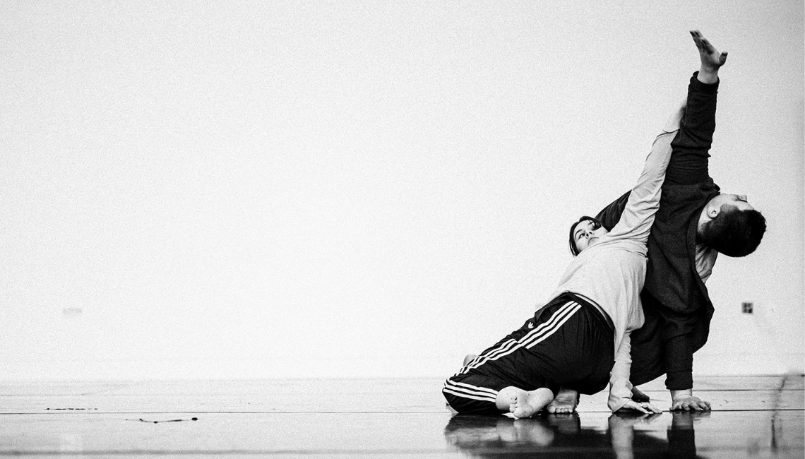 Black and white photo of two dancers
