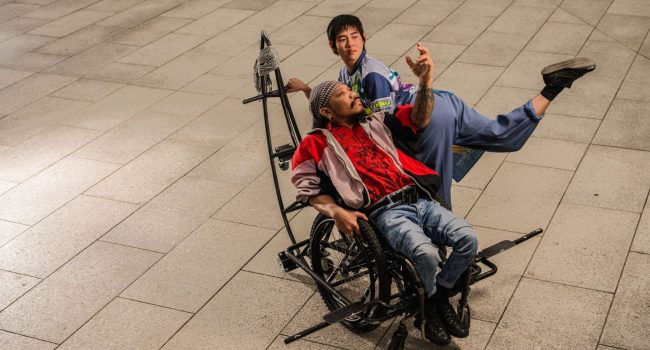 1 wheelchair dancer and 1 standing dancer