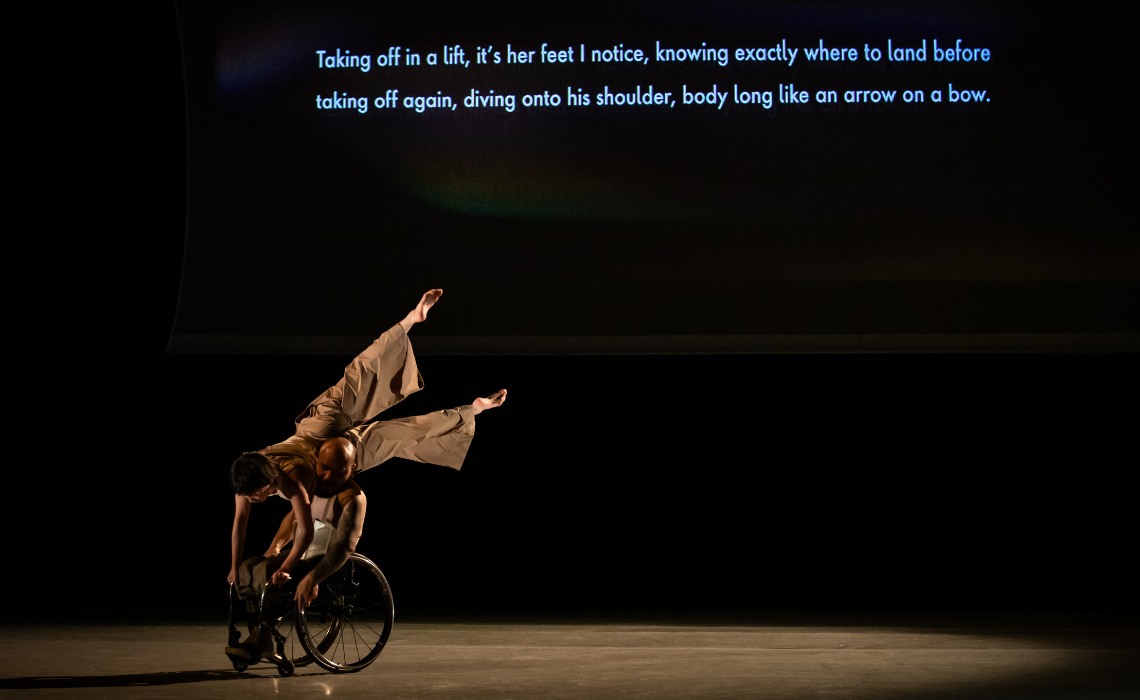 A duet between a standing dancer and a wheelchair dancer.