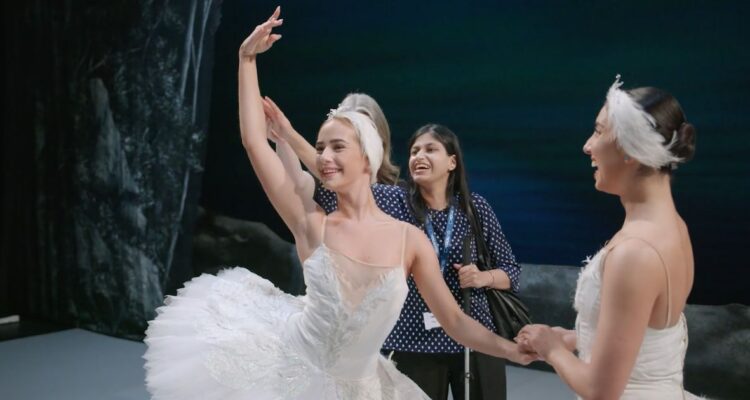 Ballet dancers in white tutus during touch tour