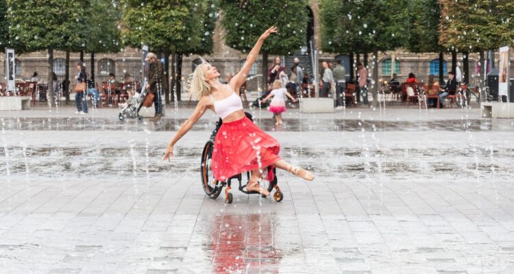 Suzie birchwood dancing in her wheelchair