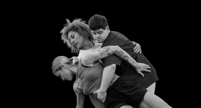 3 Disabled and non-disabled dancers support each other