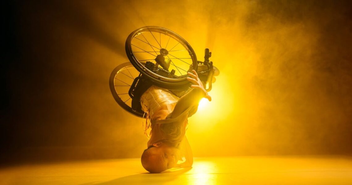 Wheelchair Dancer balancing upside down