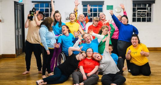 A group of learning disabled young people and Stopgap's teachers and volunteers.