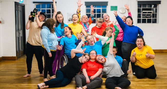 A group of learning disabled young people and Stopgap's teachers and volunteers.